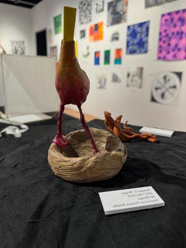 Bird standing on a nest made out of clay, 3D sculpture by <a href='http://migq.kayak150.com'>博彩网站</a> student Morgan Wright